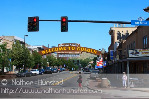 A sign welcoming visitors to downtown Golden, CO